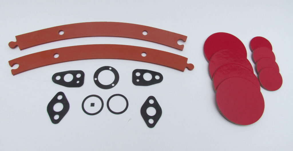 Die-cut rubber flange gaskets, washers and red silicone discs